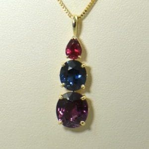 spinel three stone pendant in yellow gold 3.JPG