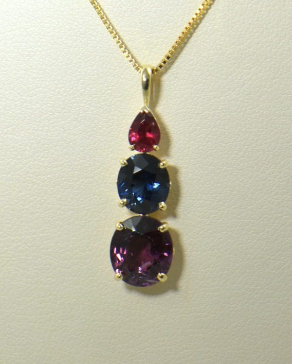 spinel three stone pendant in yellow gold 3.JPG