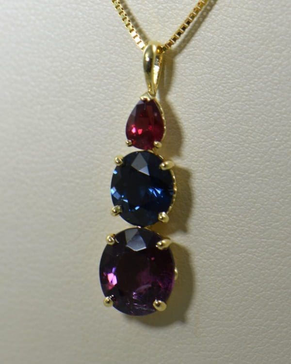 spinel three stone pendant in yellow gold 4.JPG