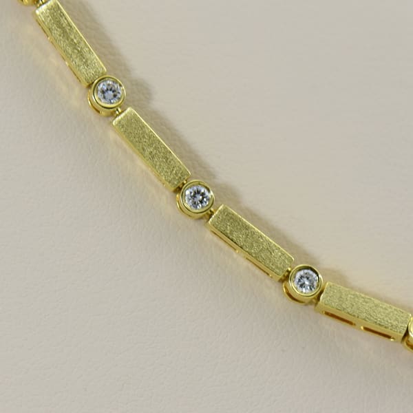 18K solid gold diamond bangle bracelet 100-BD | Mystique Jewelers |  Alexandria, VA