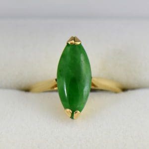 1960s marquise navette green jadeite jade solitaire in yellow gold.JPG