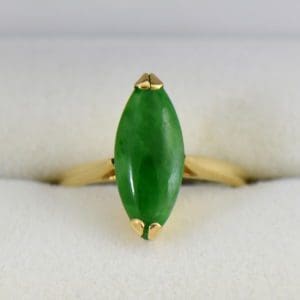 1960s marquise navette green jadeite jade solitaire in yellow gold.JPG