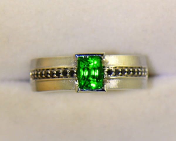 Gents White Gold Ring with Tsavorite Garnet and Black Diamonds 5 sunlight.JPG