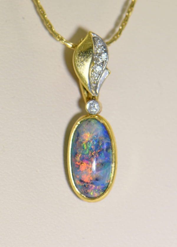 Lightning Ridge Black Opal Nobby Double Sided Spinning Pendant 18k.JPG 1