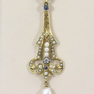 eiffel tower pearl sapphire diamone lavalier in yellow gold.JPG