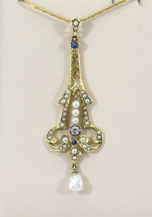 eiffel tower pearl sapphire diamone lavalier in yellow gold.JPG