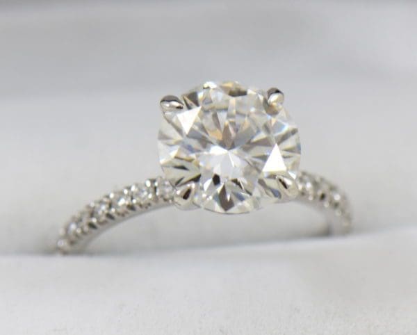 4ct moissanite solitaire engagement ring on thin diamond shank.JPG