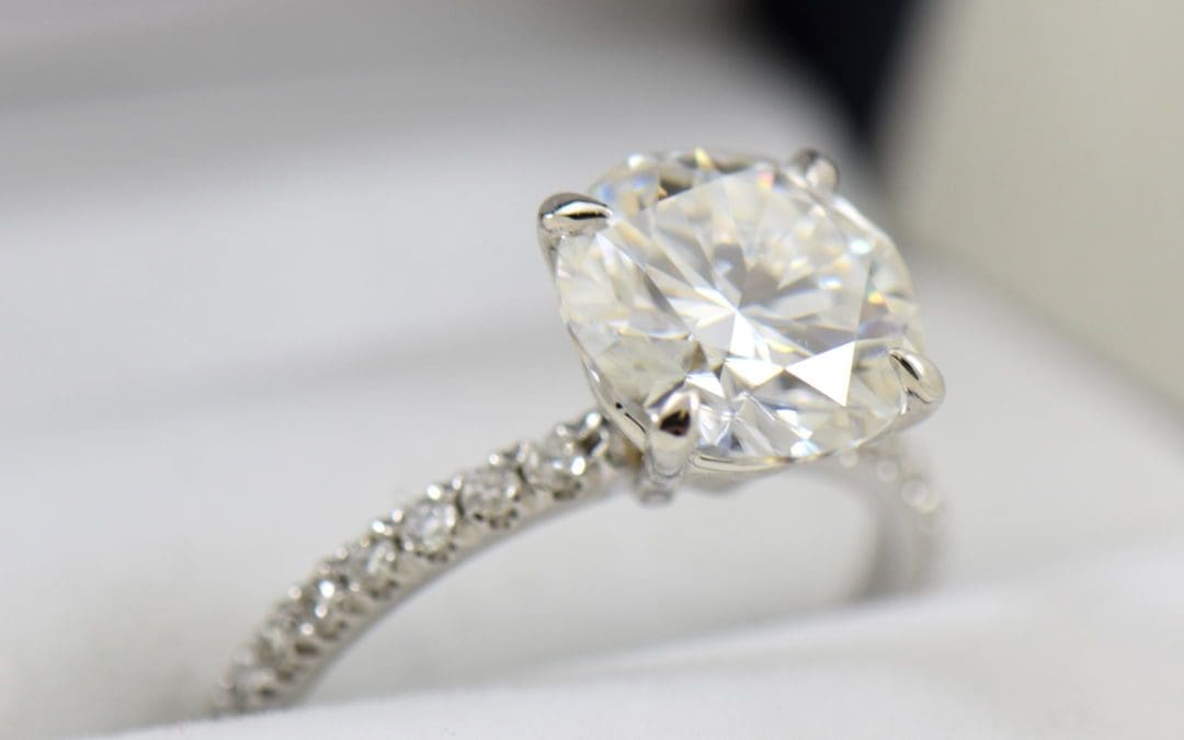 4ct moissanite solitaire engagement ring on thin diamond shank