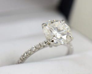 Moissanite Solitaire Engagement Ring on a Thin Diamond Shank