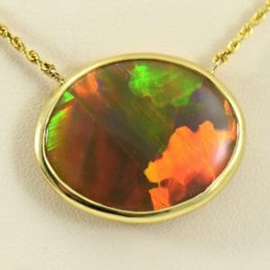 Amazing Reversible Brown base Ethiopian Opal Bezel Necklace in 14k yellow.JPG