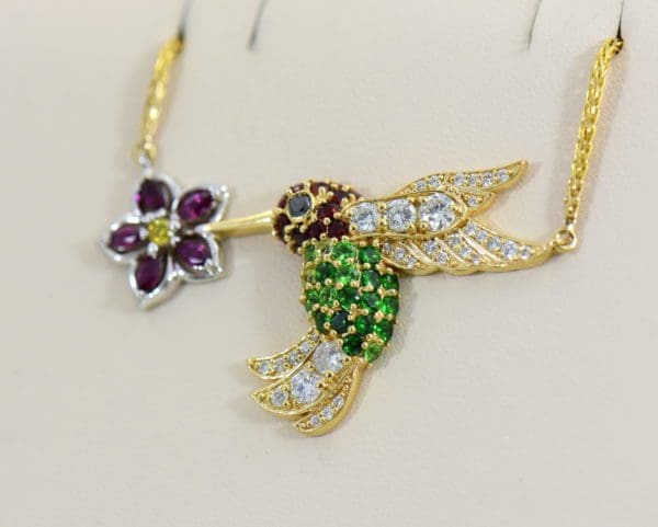 Custom Hummingbird Pendant with Rubies Tsavorite Diamonds Garnets in Yellow Gold.JPG