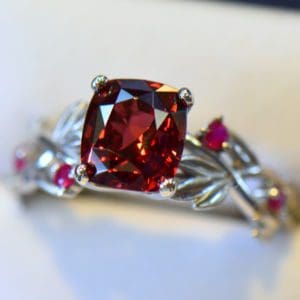 G Custom 7ct Garnet Floral Engagement Ring with Ruby Leaves in band 7.JPG
