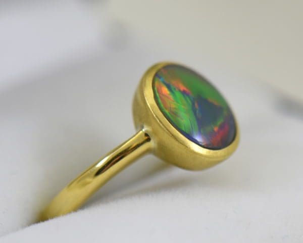 Lightning Ridge Red Flagstone Black Opal Solitaire Ring in 18k yellow gold 2.JPG