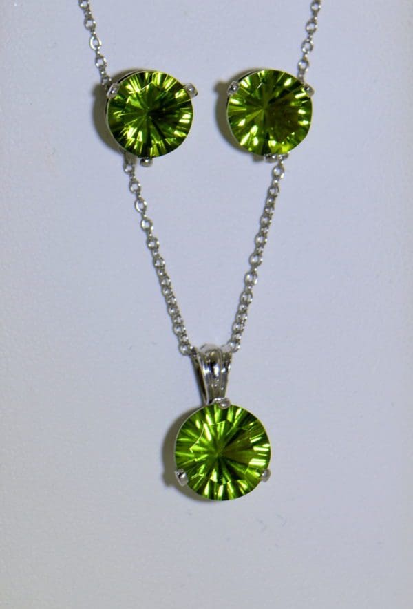 concave cut peridot stud earrings and pendant 14kw 3.JPG