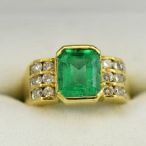3ct Gem Emerald Ring and Channel Diamond Ring.JPG