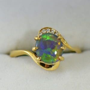 Australian Semi Black Opal set in Yellow Gold Bypass Ring Mounting with Diamond Accents 2.JPG