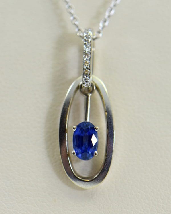 Modern Estate Oval Blue Sapphire Diamond Pendant with movable white gold frame 2.JPG