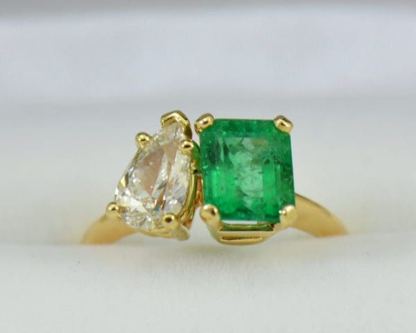 G Modern Two Stone Ring with Pear Diamond Emerald Cut Emerald yellow gold.JPG