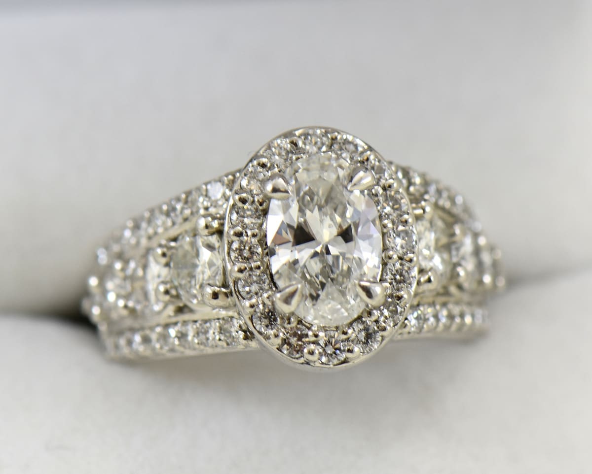 Custom Platinum Engagement Ring with Oval Diamond Halo Exquisite