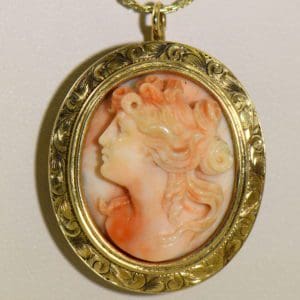 antique carved angel skin coral cameo high relief face in engraved yellow gold frame 2.JPG