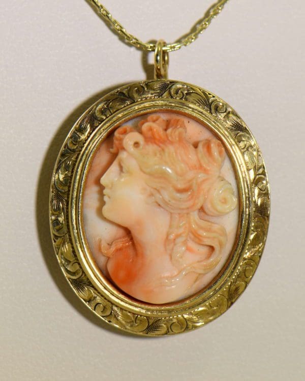 antique carved angel skin coral cameo high relief face in engraved yellow gold frame 2.JPG