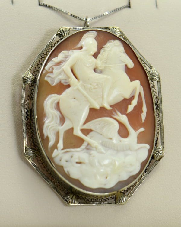 art deco shell cameo pin pendant combo with knight slaying dragon in white gold frame 2.JPG