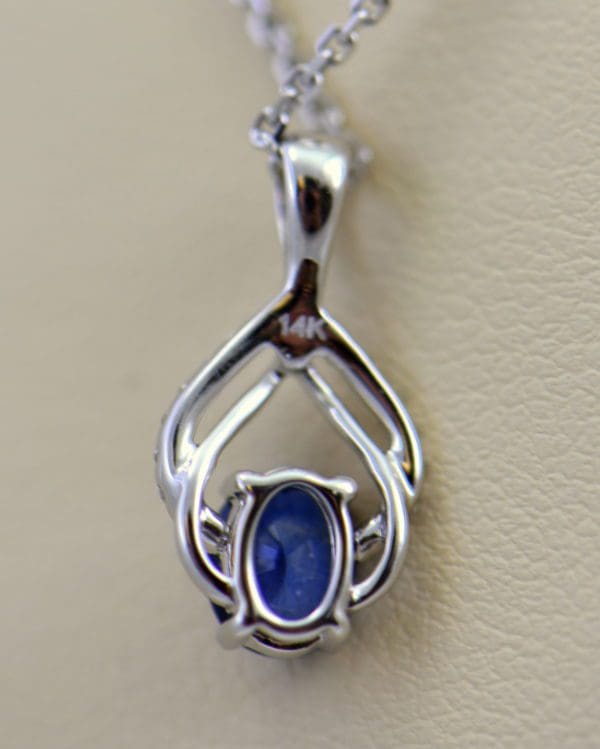 Dainty Blue Sapphire Diamond Embrace Pendant 3.JPG