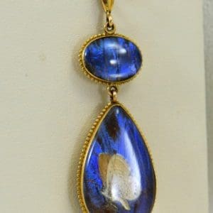 Edwardian Gold insect specimen Pendant with butterfly wing under crystal with moth.JPG