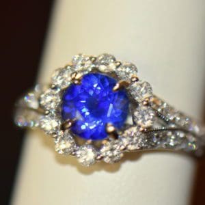 Round blue sapphire diamond halo engagement ring in white gold 5.JPG