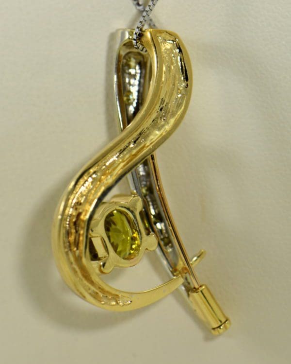 custom designed pin or pendant with sphene and yellow diamonds treble clef 3.JPG