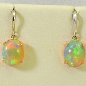 ethiopian opal earrings in rose and white gold 2.JPG