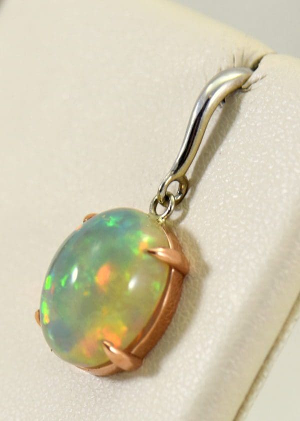 ethiopian opal earrings in rose and white gold 4.JPG