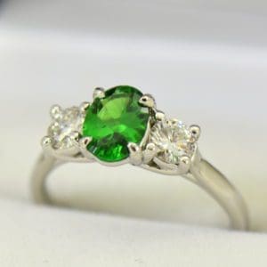 white gold three stone ring with diamonds and oval tsavorite green garnet 4.JPG