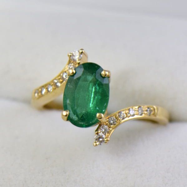 1.71ct oval emerald and diamond bypass ring african 2.JPG
