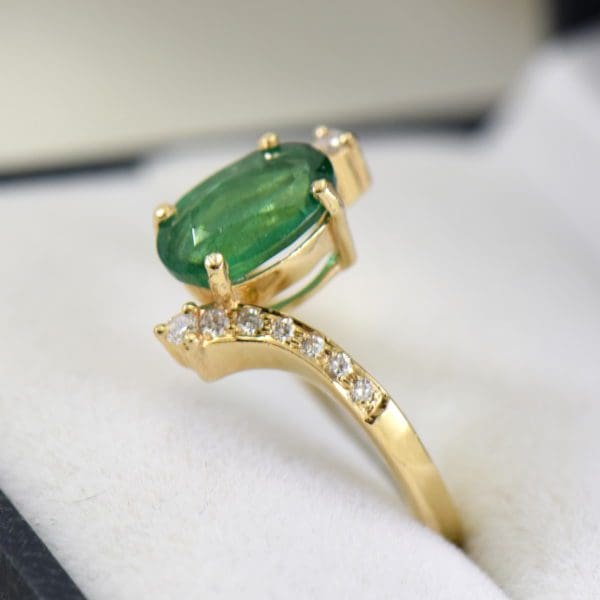 1.71ct oval emerald and diamond bypass ring african 3.JPG
