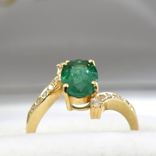 1.71ct oval emerald and diamond bypass ring african 5.JPG