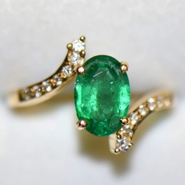 1.71ct oval emerald and diamond bypass ring african 7.JPG