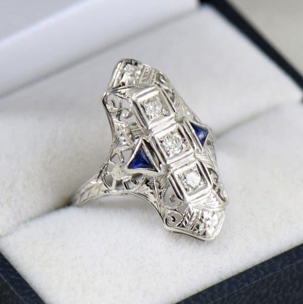 art deco dinner ring with diamond and sapphire filigree.JPG