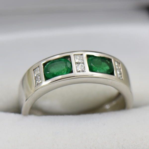 custom mens emerald wedding ring made from grandma s earrings.JPG