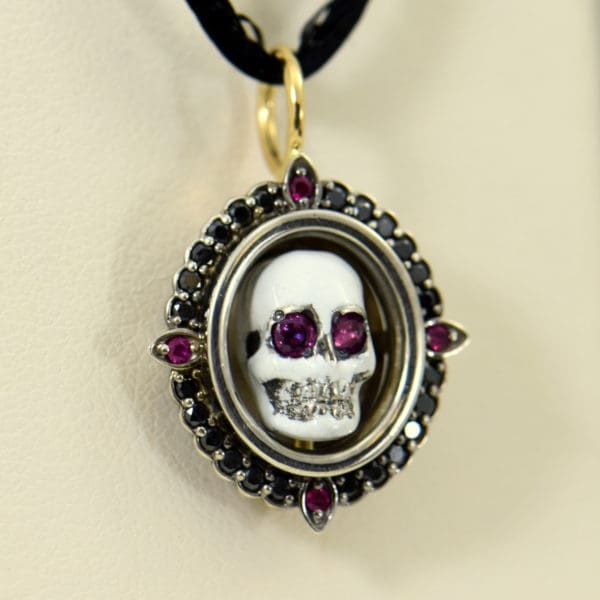 momento mori pendant enamel skull with ruby and black diamonds.JPG