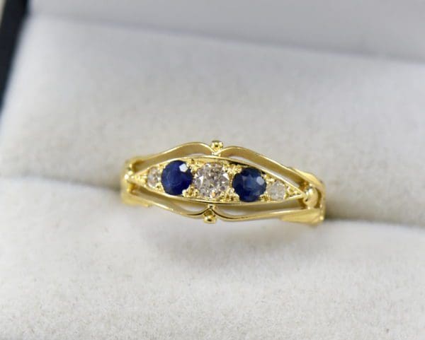 antique 18k british wedding ring with sapphires and old euro cut diamonds