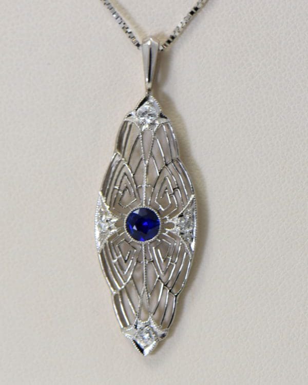 art deco platinum sapphire pendant with diamond accents.JPG