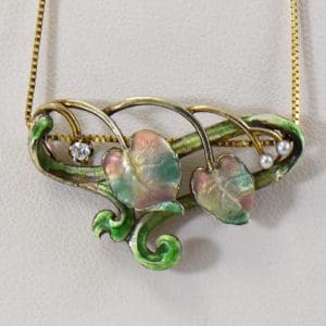 art nouveau gold necklace with enamel flowers and vines set with pearls and diamond.JPG