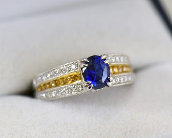 unheated royal blue sapphire ring with yellow and white diamond accents 2.JPG