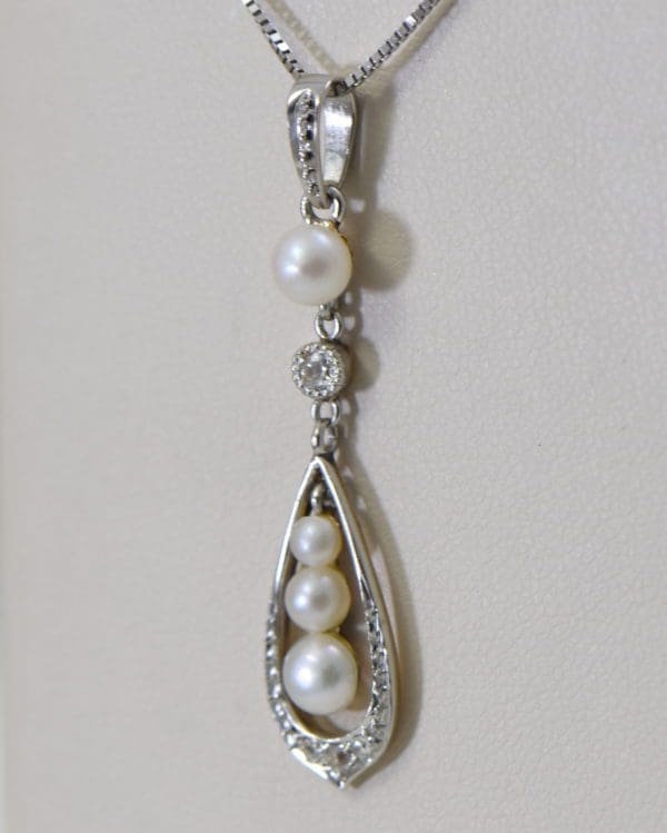edwardian platinum over gold pearl pendant with mine cut diamond accents 4.JPG