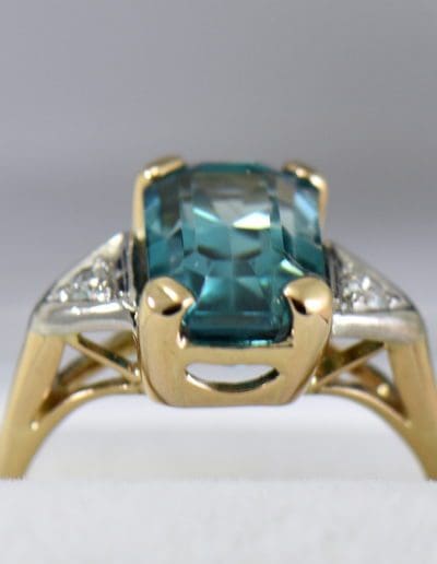 emerald cut blue zircon 3 stone ring in deco mounting 3.JPG