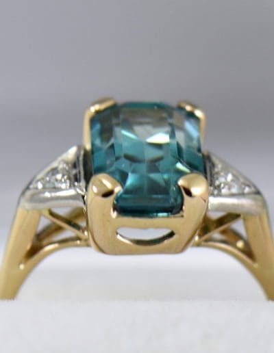 emerald cut blue zircon 3 stone ring in deco mounting 3.JPG