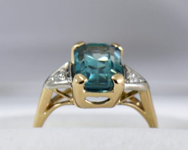 emerald cut blue zircon 3 stone ring in deco mounting 3.JPG
