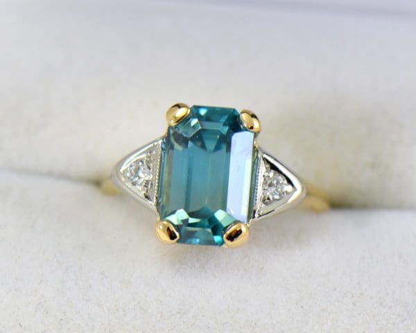 emerald cut blue zircon 3 stone ring in deco mounting 7.JPG