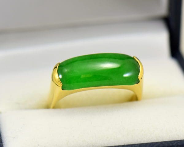 estate 18k yellow gold saddle ring with fine green jadeite jade.JPG